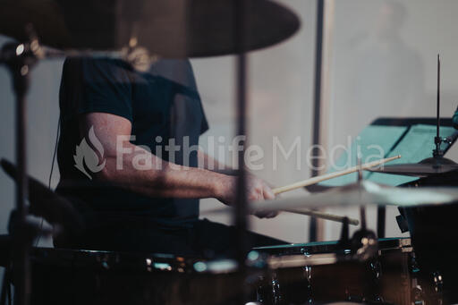 Person Playing Drums