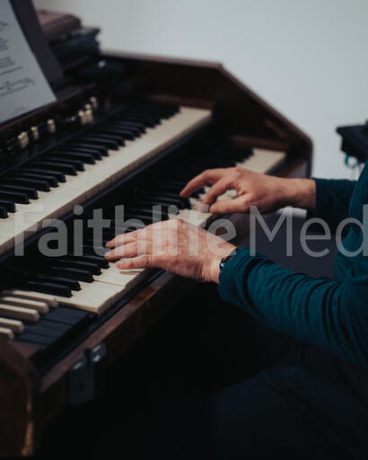 Person Playing Piano