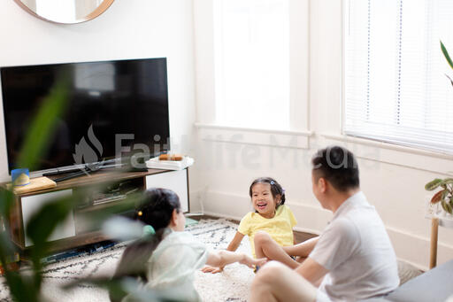 Family Playing Together in the Living Room