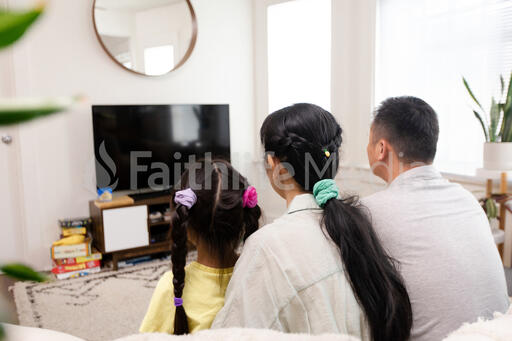 Family Watching TV Together