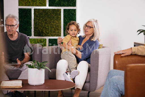 Child Sitting with Grandmother