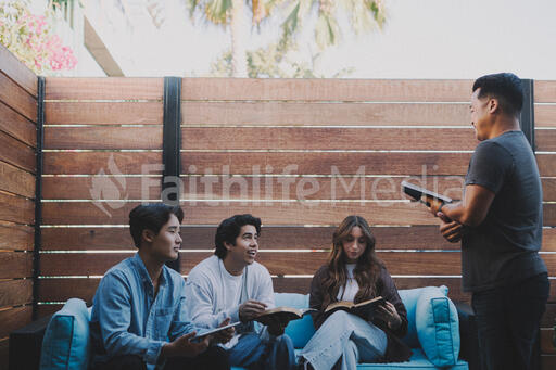 College Group Having Bible Study Together