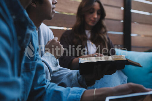 College Group Having Bible Study Together