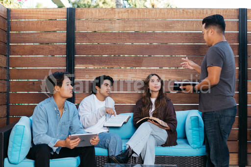 College Group Having Bible Study Together