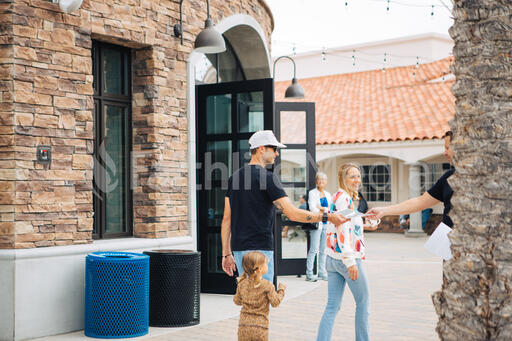 Young Family Walking into Church