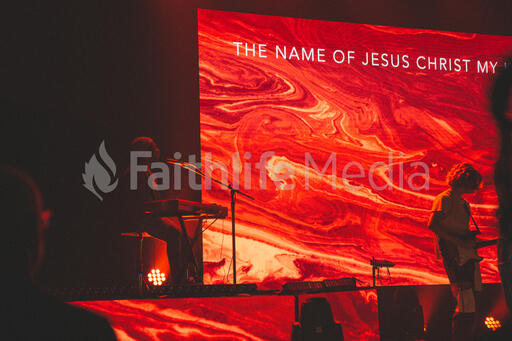 Worship Team Member Playing Keyboard on Stage