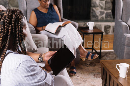 Multi-Generational Family Doing Devotions Together