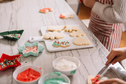 Kids Decorating Christmas Cookies Together  image 1