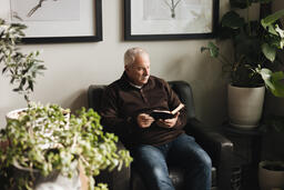 Senior Man Reading the Bible at Home  image 8