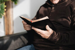 Senior Man Reading the Bible at Home  image 1