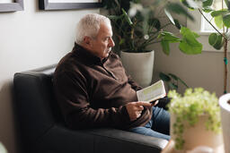 Senior Man Reading the Bible at Home  image 2
