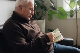 Senior Man Reading the Bible at Home  image 6
