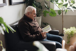 Senior Man Reading the Bible at Home  image 7