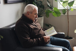 Senior Man Reading the Bible at Home  image 4