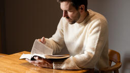 Man Reading the Bible Alone  image 6
