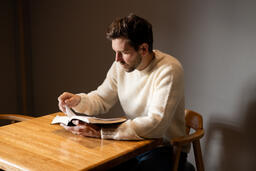 Man Reading the Bible Alone  image 5