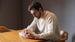 Man Reading the Bible Alone  image 9