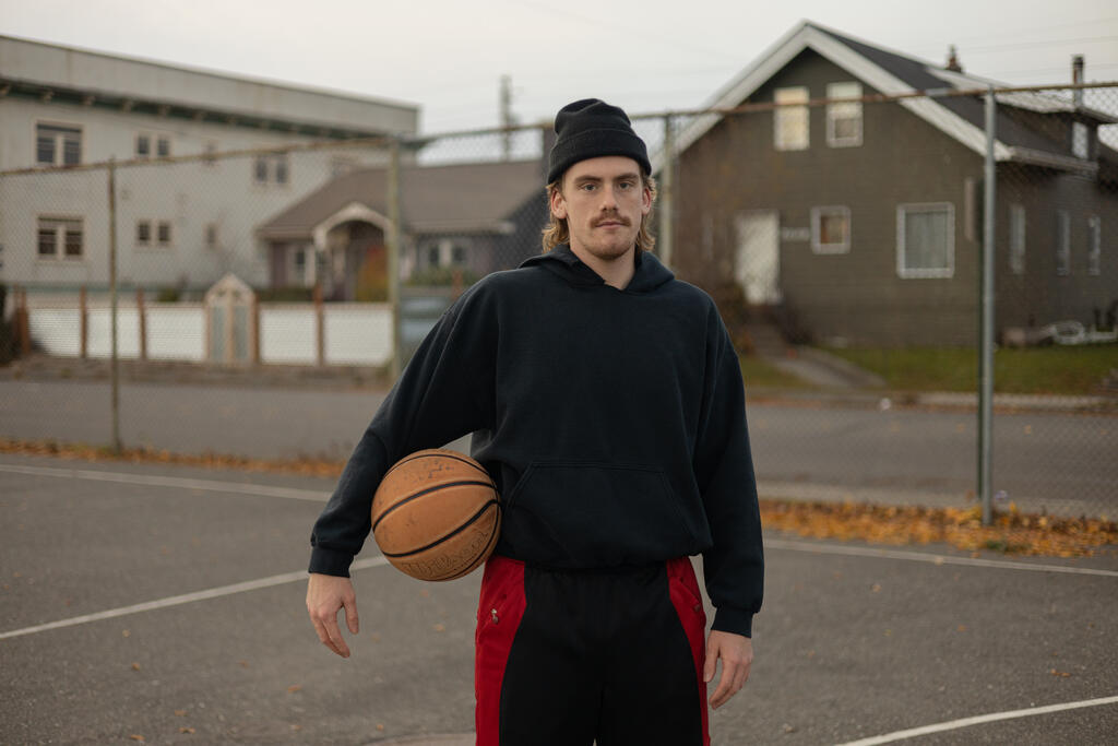 Man Holding a Basketball large preview