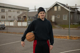 Man Holding a Basketball  image 3