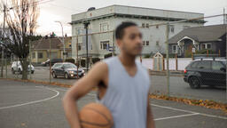 Man Holding a Basketball  image 1