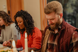 Friends Praying Before Thanksgiving Dinner  image 9