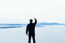 Man Raising His Hands in Worship Outside  image 1