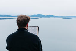 Man Reading the Bible Outside  image 5