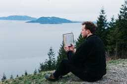 Man Reading the Bible Outside  image 1