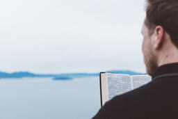 Man Reading the Bible Outside  image 4