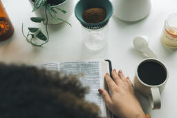 Woman Reading the Bible while Making Coffee  image 6