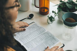 Woman Reading the Bible while Making Coffee  image 5