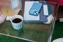 Tablet, Smart Phone and Coffee Mug on a Coffee Table  image 2