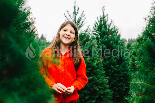 Young Girl at a Christmas Tree Farm