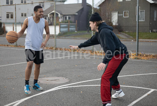 Men Playing Basketball