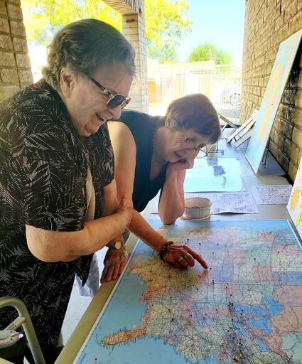 Map Pinning Anita Shiply and Phebe Packer