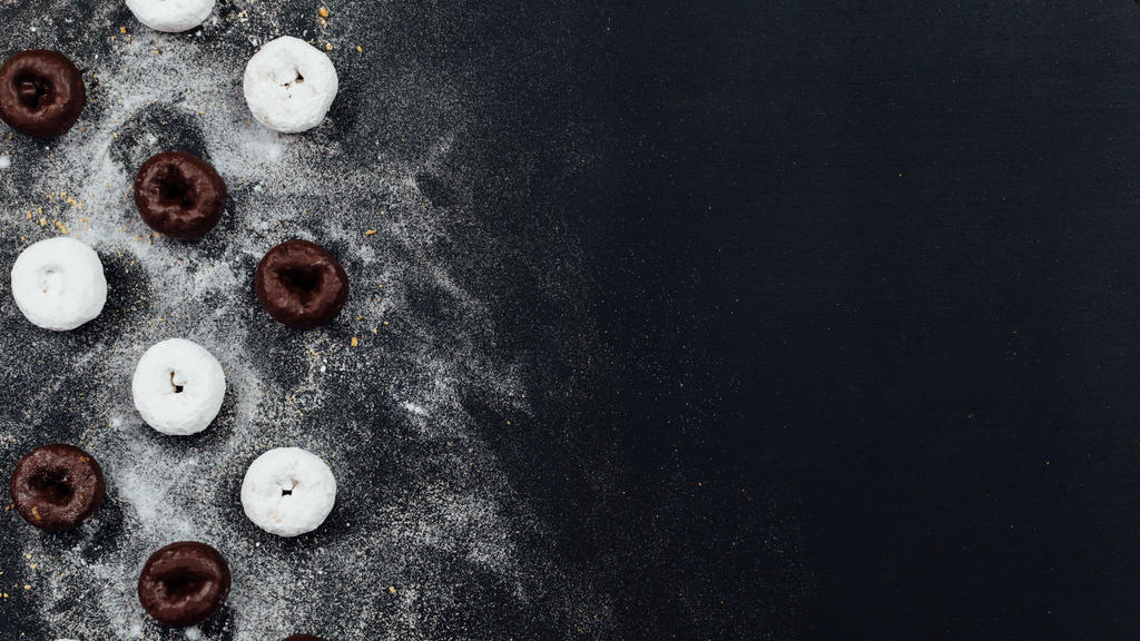 Powdered and chocolate donuts dusted with sugar large preview