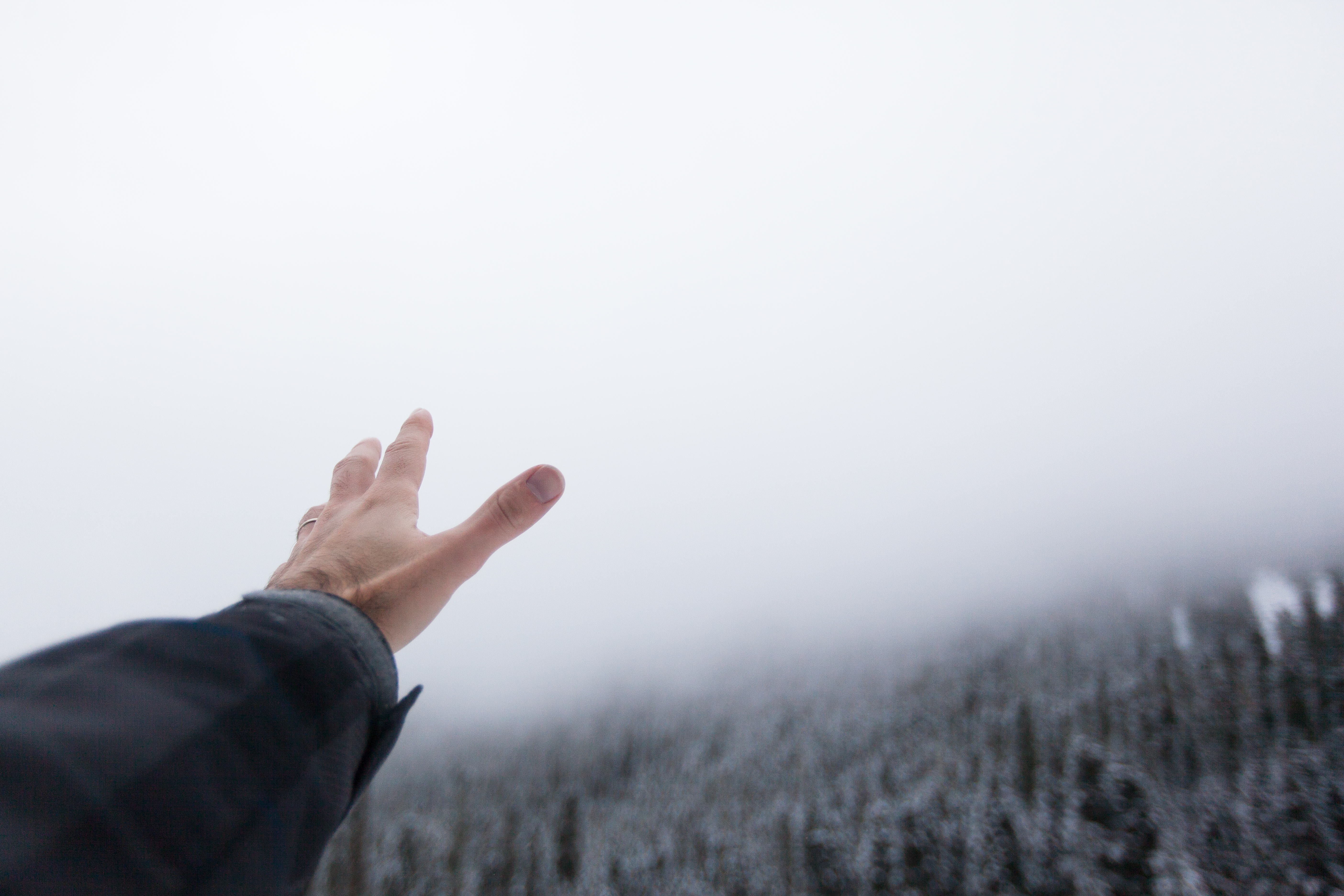 Winter Wonderland man reaching for fog